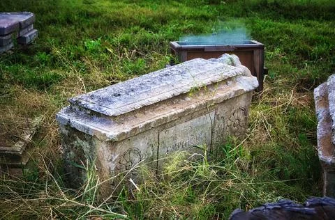 Old stone coffin Stock Photos