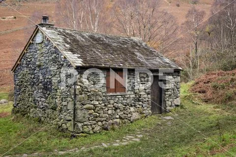 Old stone cottage at Ashness Bridge, Lake District, England Stock Photos