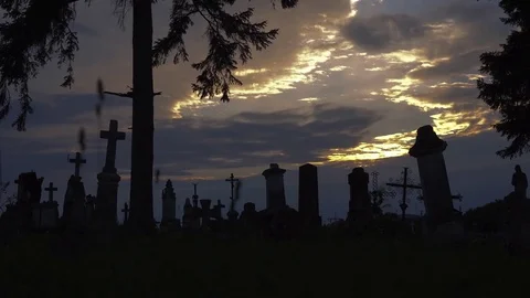 Old stone crosses on cemetery Vídeo Stock 76749859