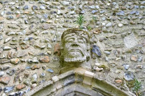 Old stone face Stock Photos
