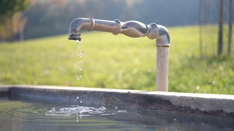An old stone fountain in slowmotion 動画素材 98656053