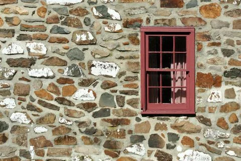 Old stone house with window Stock Photos