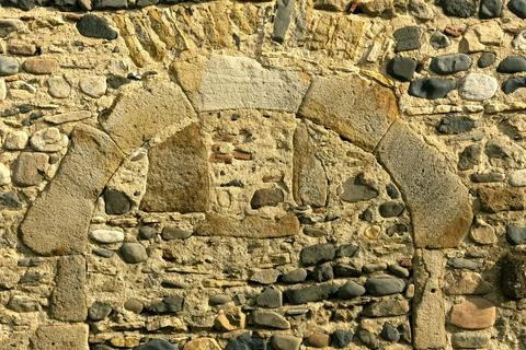 Old stone-made wall for an abstract background Stock Photos