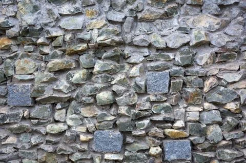 Old stone masonry. Background texture. Stock Photos