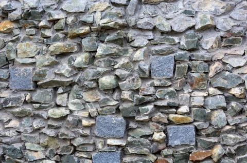 Old stone masonry. Background texture. Stock Photos