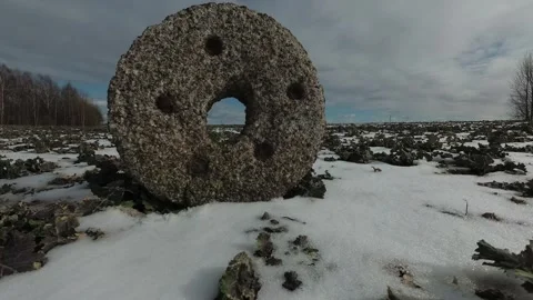 Old stone mill on spring field with snow and clouds, time lapse Stock Footage 262343179