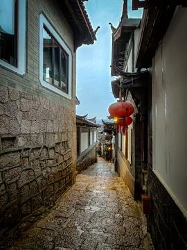 Old stone pathway between historic village houses Stock-Fotos