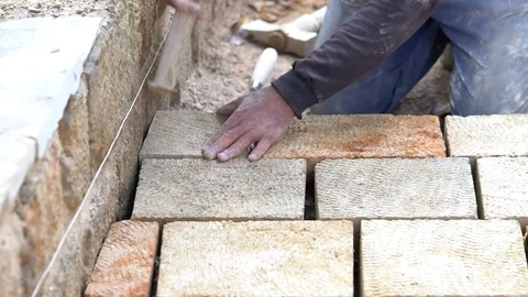 Old stone pavers master. SLOW MOTION Video stock 84098199