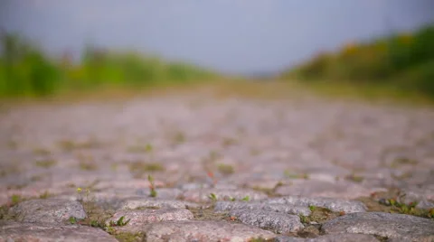 Old stone road in a field Stock-Footage 62594885