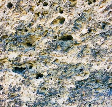 Old stone rock material texture close up background Stock Photos