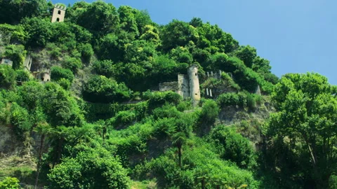 Old stone ruins hidden among greenery near Lake Como Видео 325545405