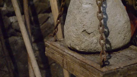 The old stone on the scales Stock Footage 94427260