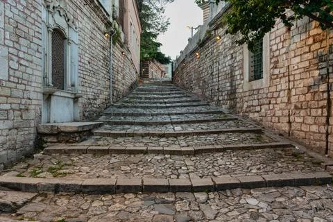 Old stone steps and cobblestone street leading to Laleli Camii in Istanbul Stock Photos