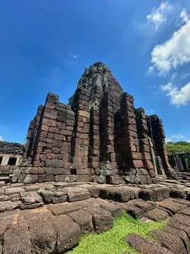 Old stone structure with clear blue sky Stock Photos