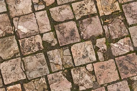 Old stone surface from light brown blocks granite background Stock Photos