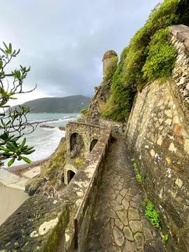 Old stone tower and path near sea in fall in Italy. Municipality Moneglia Stock Photos