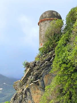 Old stone tower and path near sea in fall in Italy. Municipality Moneglia Stock Photos