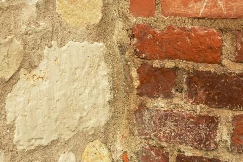 Old stone wall and brick Stock Photos