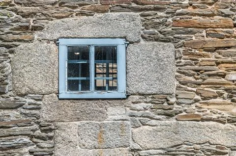 Old stone wall and window Stock Photos