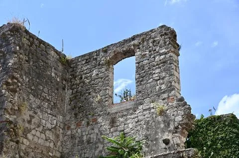 Old Stone Wall Arch Window Opening with Blue Sky View Stock Photos