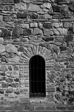 Old Stone Wall with Arched Window and Bars, Malaga Stock Photos