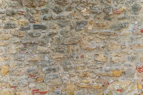 Old stone wall as a background or pattern Stock Photos