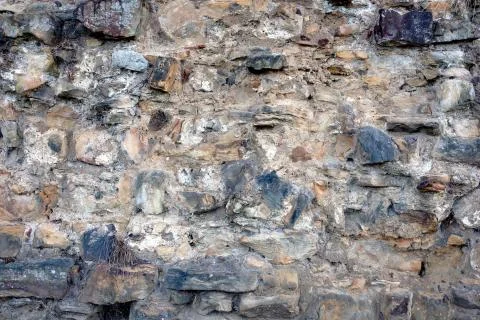 Old stone wall, a background or texture Stock Photos