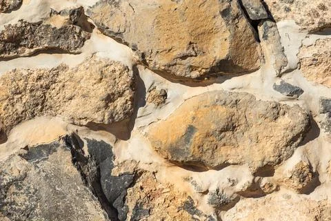 Old stone wall background Stock Photos