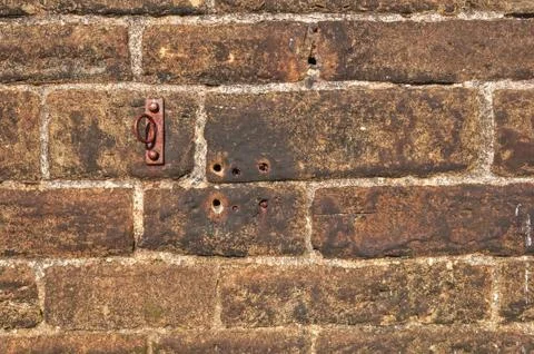 Old Stone wall Background Rusted Iron Ring Stock Photos