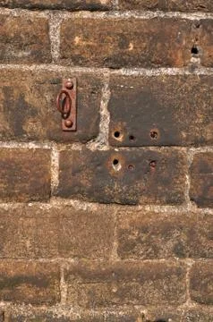 Old Stone wall Background Rusted Iron Ring Stock Photos