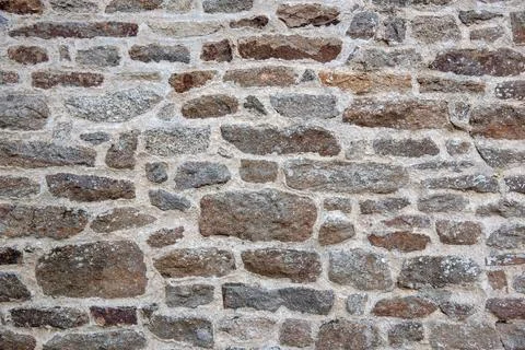 Old stone wall background texture. Stock Photos