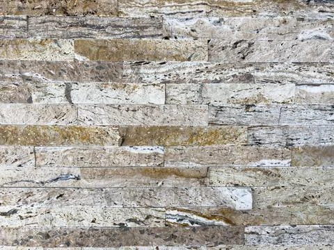 Old stone wall of a building. Stone wall as background or rustic pattern for Stock Photos
