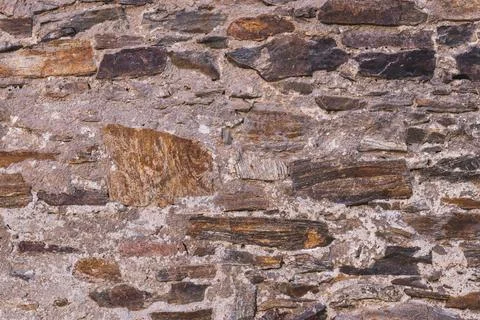 Old stone wall, close up view Stock Photos