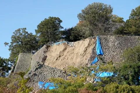 Old stone wall collapsed Stock Photos