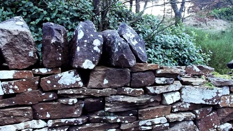 An old stone wall Stock Footage 77863151