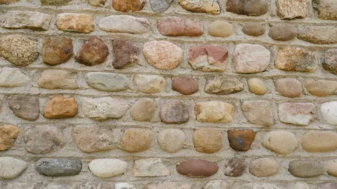 The old stone wall of the house, closeup shot Stock Footage 121407647