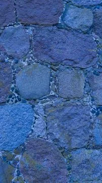 An old stone wall. Masonry. Background of blue stones. The texture of the sto Stock Photos