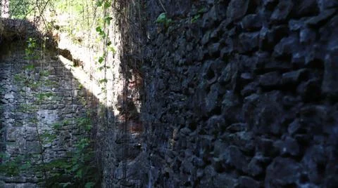 Old stone wall of the mill Stock Photos