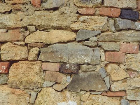 Old Stone Wall Mixed With Bricks Texture Stock Photos