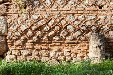 Old stone wall with a pattern; Delphi, Greece Stock Photos
