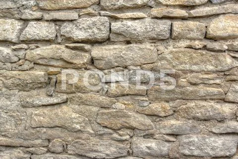 Old stone wall Stock Photos