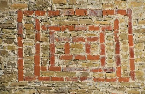 Old stone wall with red bricks hacking Antique stone wall texture with red... Stock-Fotos