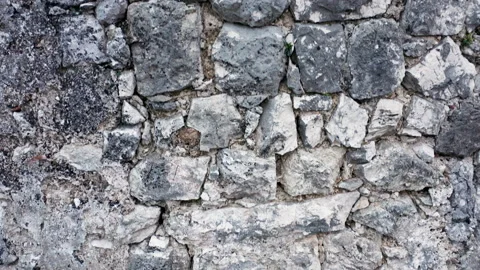 Old stone wall - rough texture of aged vintage ruin of an ancient building Stock Footage 165336200