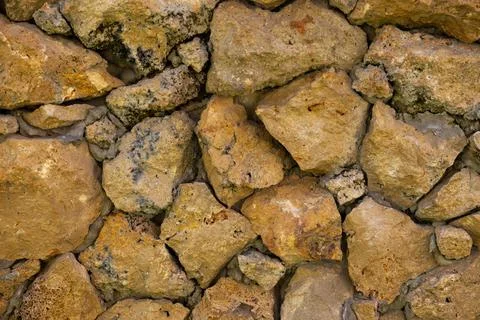Old stone wall texture and background Stock Photos