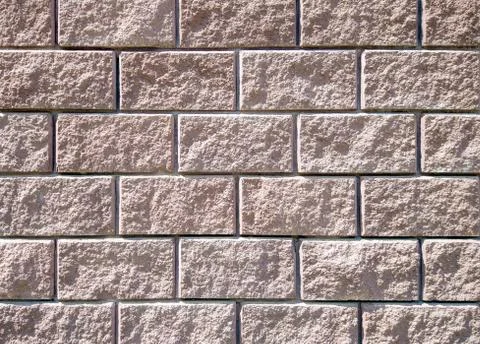 Old stone wall texture background natural granite material Stock Photos