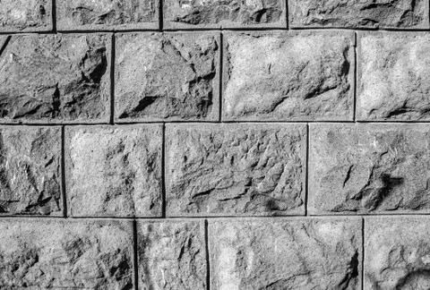 Old stone wall texture, closeup of brick pattern surface. Fotos Stock