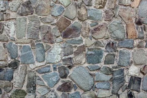 Old stone wall texture. Stock Photos