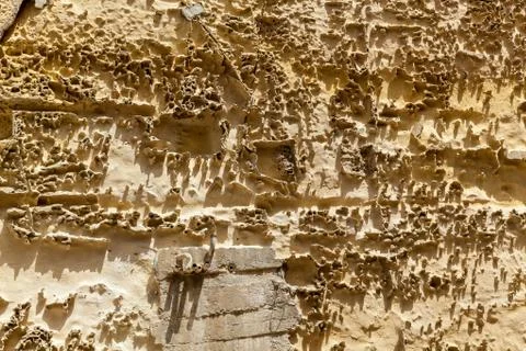 An old stone wall texture Stock Photos