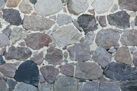 Old stone wall texture. Stock Photos