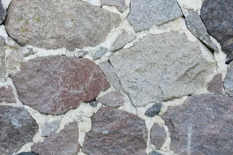 Old stone wall texture. Stock Photos